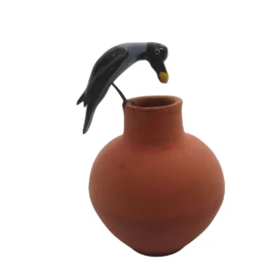 Hand-painted terracotta figurine of the thirsty crow perched on a clay pot, handcrafted natural clay decor by Vins Art House.