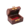 Handcrafted mini wooden treasure chest jewelry box open showing red velvet interior.