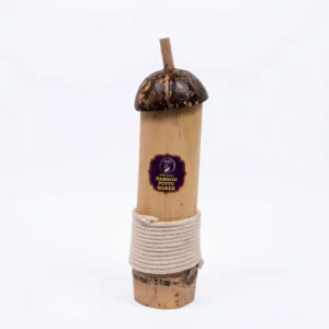 A handcrafted Givieo Natural bamboo puttu maker with a polished coconut shell lid and coir rope grip, standing vertically on a white background
