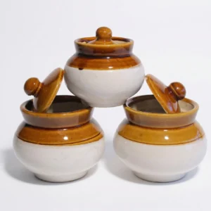 A professional set of three 500ml ceramic storage jars with brown glazed tops and cream bases, arranged in a row to show the complete 3-piece set.