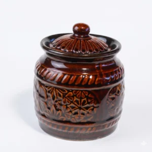 Front view of Givieo embossed brown ceramic jar with lid on a white background.