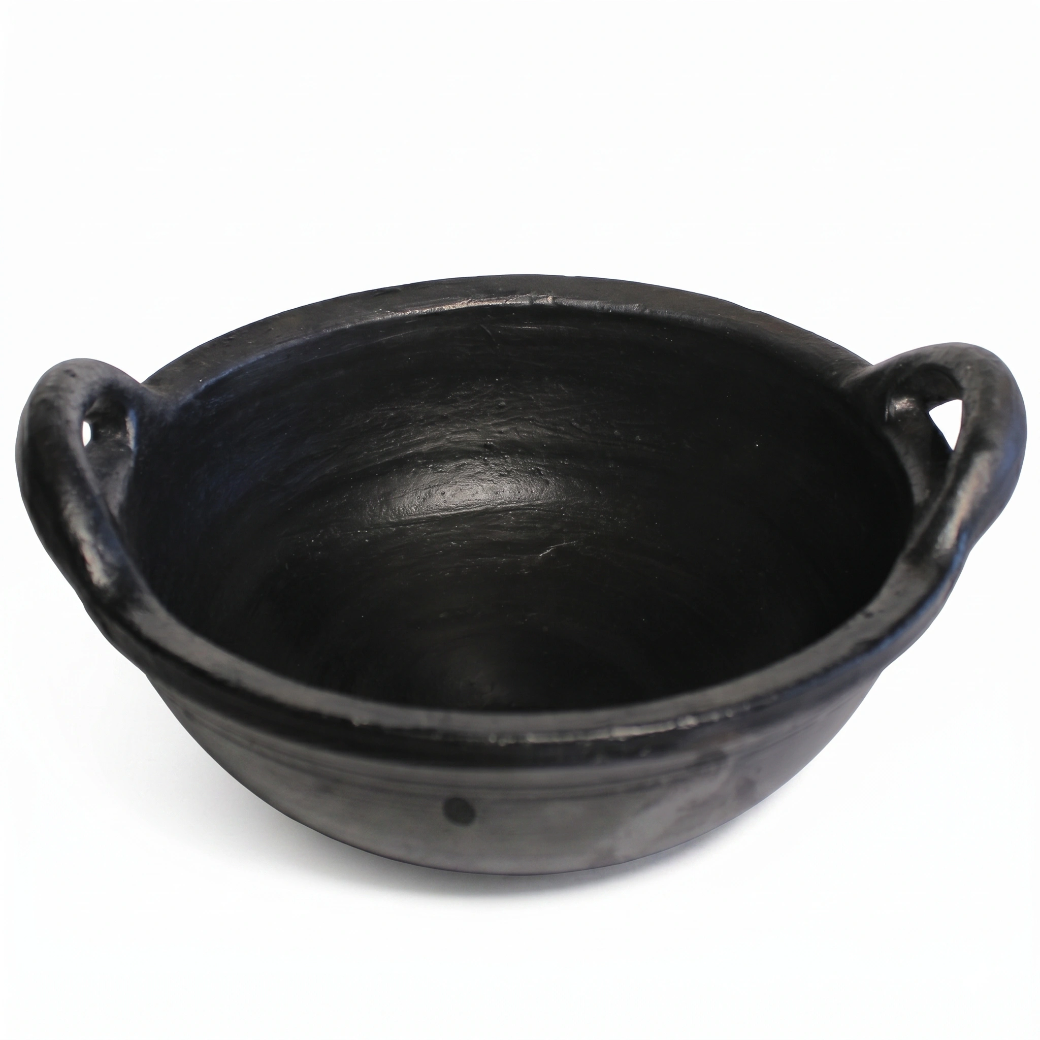 Premium black terracotta kadai with dual handles from Vins Art House, handcrafted clay cooking pot on white background.