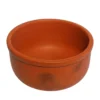 Traditional red terracotta deep cooking pot filled with spicy fish curry.