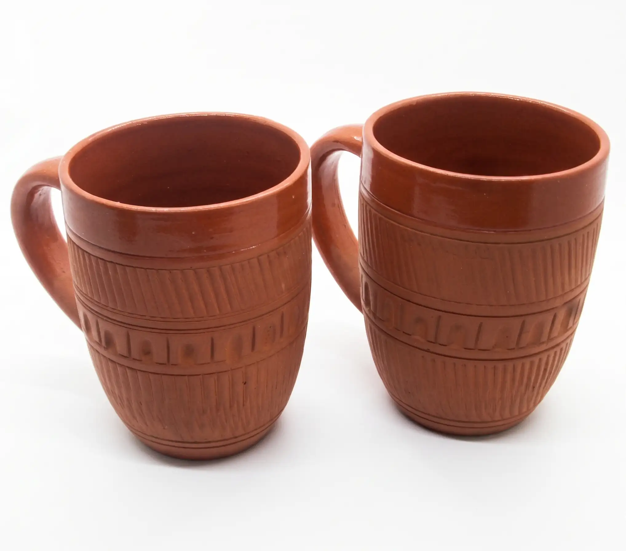 vins-art-house-artisan-clay-coffee-mug-smooth-rim-and-geometric-carving-view